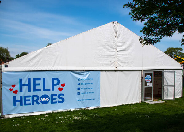 Reading, United Kingdom - May 08 2020:  A Marquee for nurses to collect essential food supplies from the charity Help NHS Heroes during the Coronavirus Crisis, off Erleigh Road