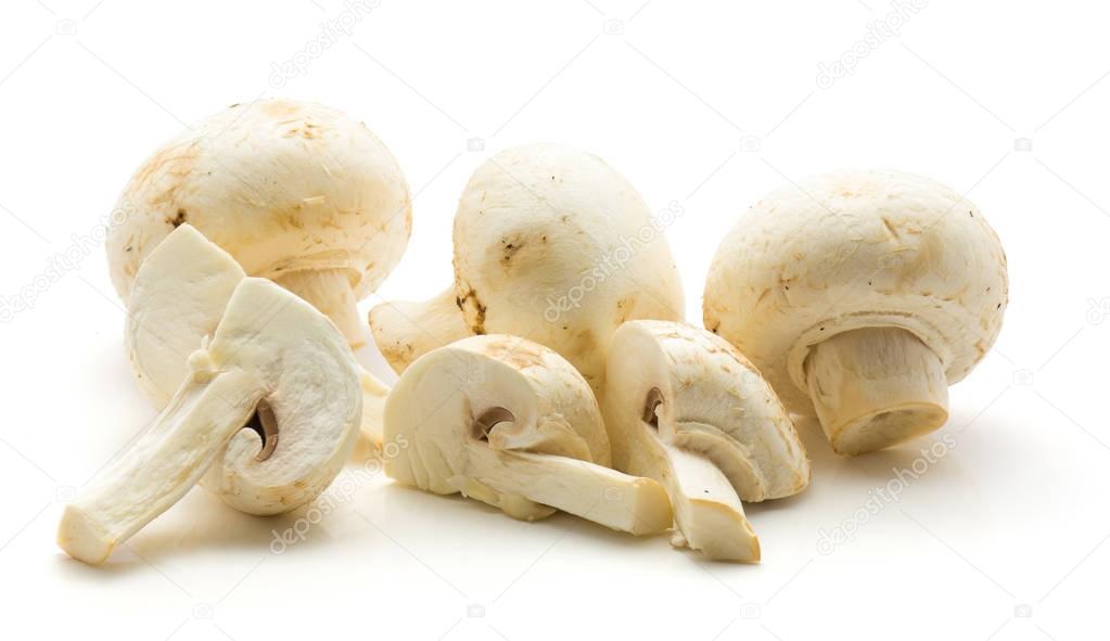 Champignons sliced isolated on white background three whole three quarter