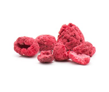 Freeze dried raspberries stack isolated on white backgroun clipart