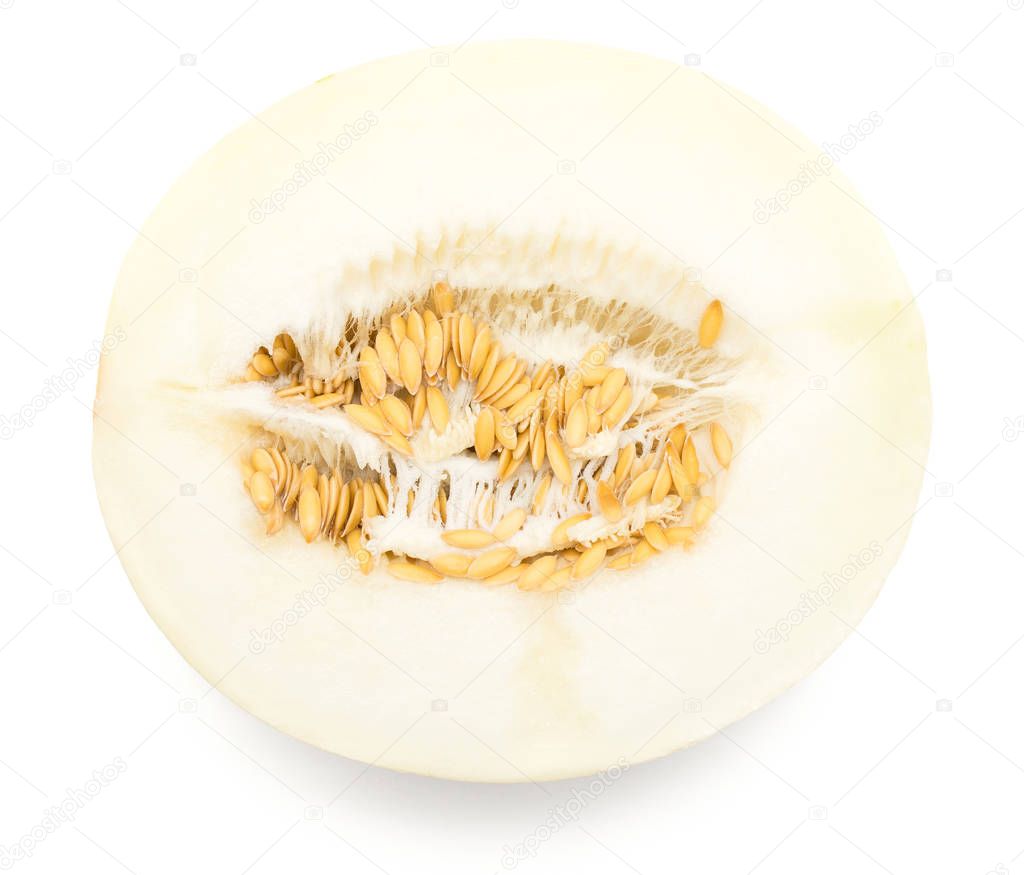 One melon (Piel de Sapo, Honeydew) half with seeds top view isolated on white backgroun