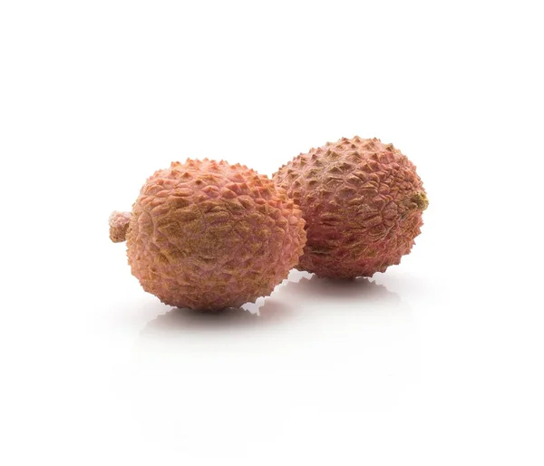 stock image Two lychee isolated on white background ripe pink fresh berrie