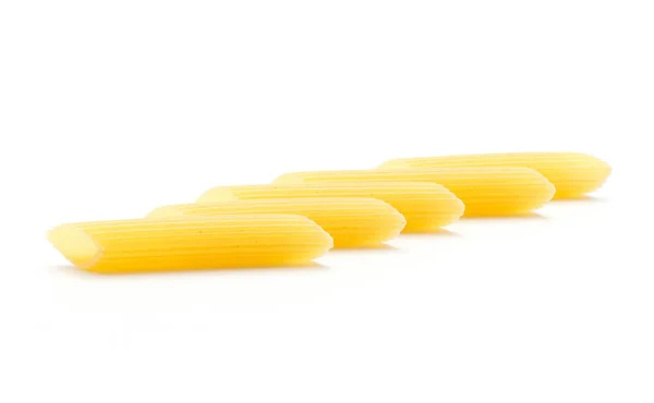 Penne Rigate Five Pieces Row Isolated White Background Dry Raw — Stock Photo, Image