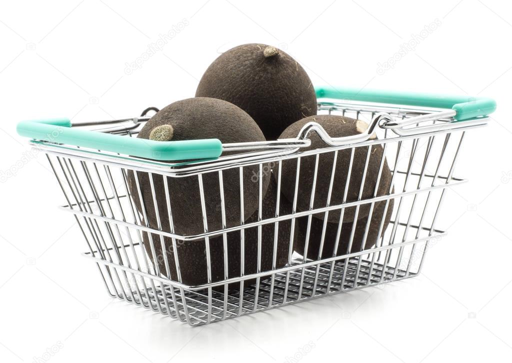 Black radish in a shopping basket isolated on white background