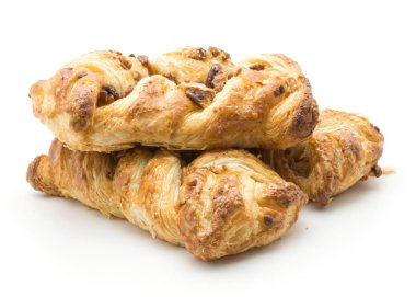 Pekan somun ve reçel insid beyaz zemin üzerine izole büküm ekmek yığını