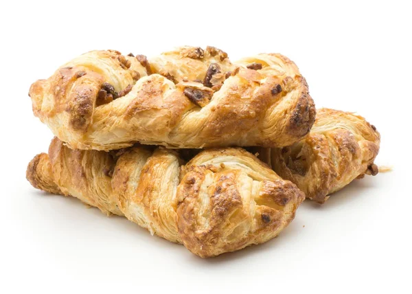 Pekan somun ve reçel insid beyaz zemin üzerine izole büküm ekmek yığını