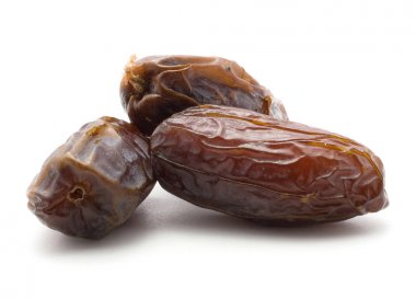 Üç tarihi meyve Medjool beyaz adam izole