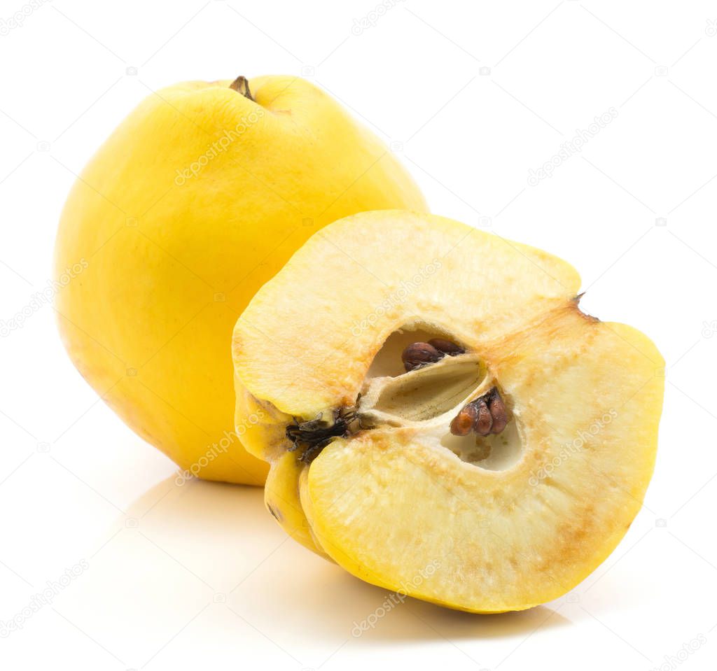 Yellow quince isolated on white background raw ripe one whole and one cross section half