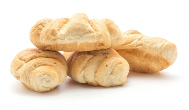 Pişmiş kruvasanlar veya cornetto kümesi beyaz arka plan üzerinde dört bütün ve nitelikleri izole