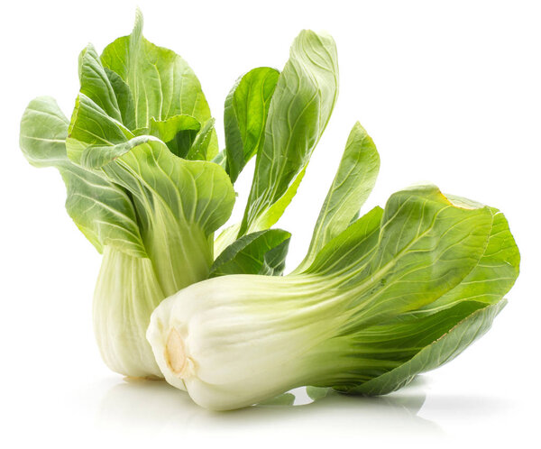 Bok choy (Pak choi) two cabbages with green leaves isolated on white background fresh ra