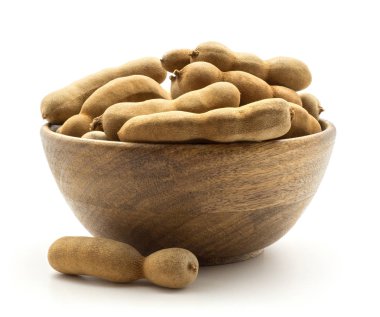 Tamarind Hint tarihleri üzerinde beyaz adam izole kahverengi ahşap kase