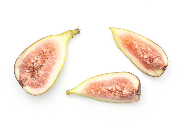 Cut figs top view isolated on white background one half two slices ripe purple green rose fles