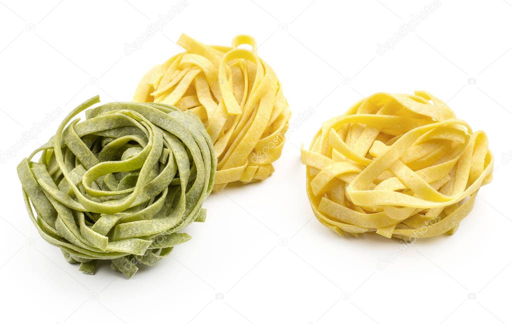 Fettuccine raw pasta spinach and classic isolated on white background three piece