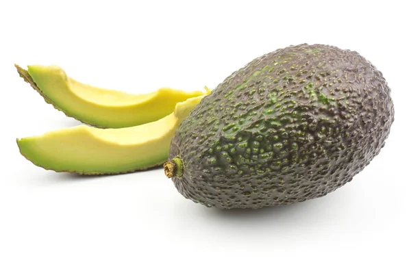 Twee Avocado Segmenten Één Geheel Groen Bruin Geïsoleerd Een Witte — Stockfoto