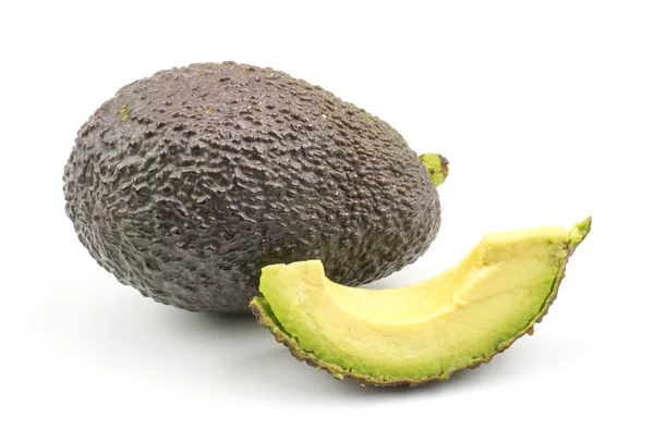 Avocado Één Segment Geïsoleerd Een Witte Achtergrond Rijp Groen Bruin — Stockfoto