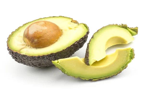 Twee Vers Gesneden Plakjes Avocado Een Helft Met Een Zaadje — Stockfoto