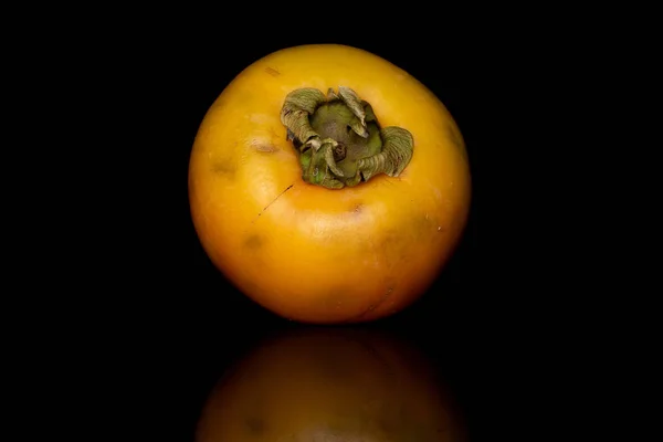 Zoete oranje persimmon geïsoleerd op zwart glas — Stockfoto