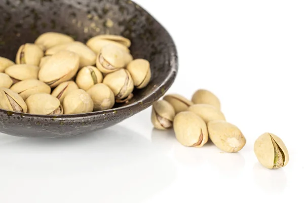 Salted pistachio isolated on white — ストック写真