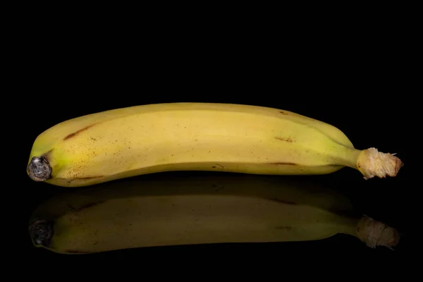 Banana amarela doce isolada em vidro preto — Fotografia de Stock