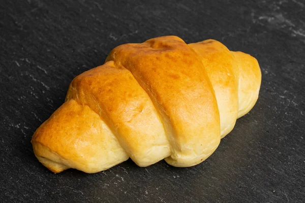 Sweet mini croissant on grey stone — Stock Photo, Image