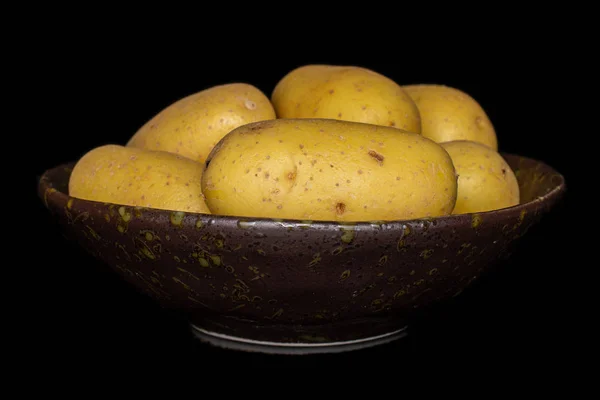 Batata amarela pálida isolada em vidro preto — Fotografia de Stock