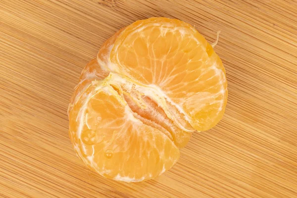 Fresh orange mandarin on light wood — Stock Photo, Image