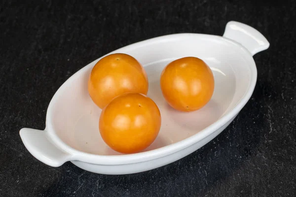 Physalis laranja fresco em pedra cinzenta — Fotografia de Stock