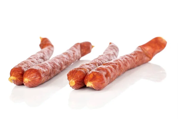 Smoked spicy sausage isolated on white — 스톡 사진