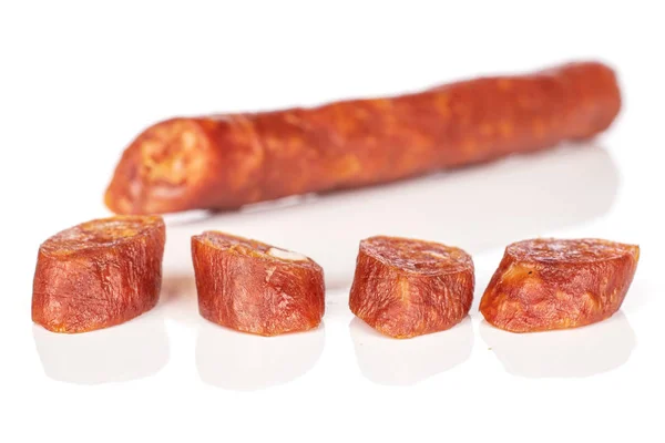 Smoked spicy sausage isolated on white — 스톡 사진