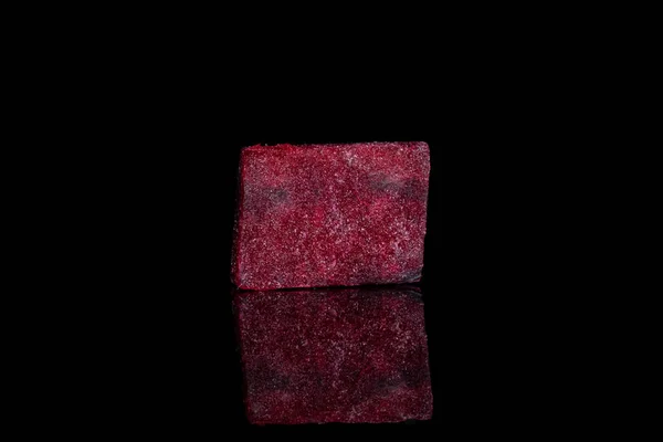 Raw sweet beetroot isolated on black glass