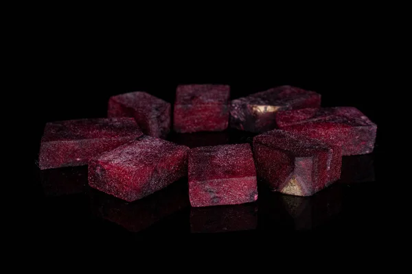 Raw sweet beetroot isolated on black glass