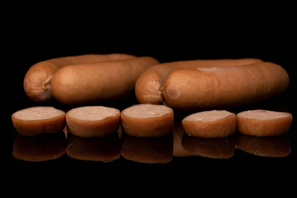 German pork sausage isolated on black glass — Stock Photo, Image