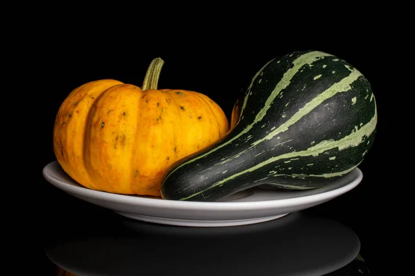 Decorative gourd isolated on black glass — ストック写真