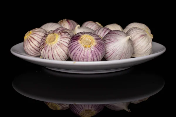 Single clove garlic isolated on black glass — 图库照片