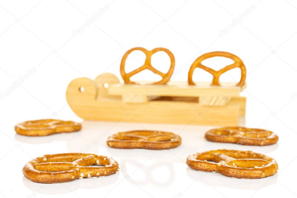 Salty brown pretzel isolated on white