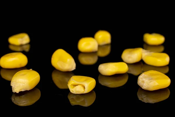 Lot Pieces Canned Yellow Corn Sweet Isolated Black Glass — Stock Photo, Image