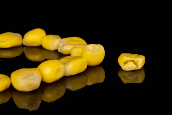 Lot Pieces Sweet Canned Yellow Corn Isolated Black Glass — Stock Photo, Image