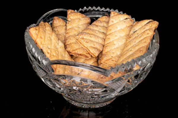 Lot Whole Square Puff Cookie Raisins Crystal Bowl Isolated Black — Stock Photo, Image