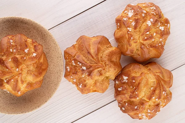 Group Four Whole Fresh Baked Profiterole White Wood — Stock Photo, Image