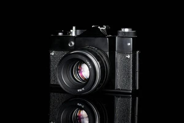 One Whole Black Vintage Camera Isolated Black Glass — Stock Photo, Image