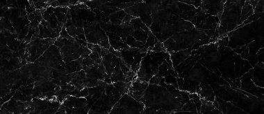 Arka plan veya tasarım sanatı çalışmaları için doğal desen ile siyah mermer doku. Yüksek çözünürlüklü mermer