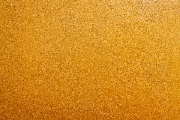 Gelbe Wand Textur Hintergrund. Wandhintergrund gelb. — Stockfoto