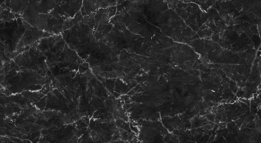 Arka plan veya tasarım sanatı çalışmaları için doğal desen ile siyah mermer doku. Yüksek çözünürlüklü mermer