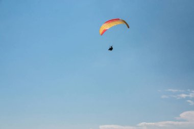 man flying on paraglider  clipart