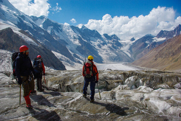 people hiking in mountains