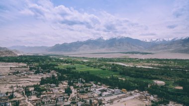 aerial view of Leh cityscape and beautiful mountains in Indian Himalayas clipart