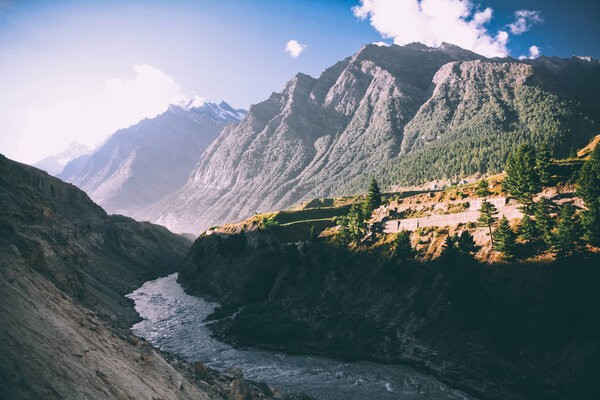 beautiful mountain river in valley and majestic mountains in indian himalayas