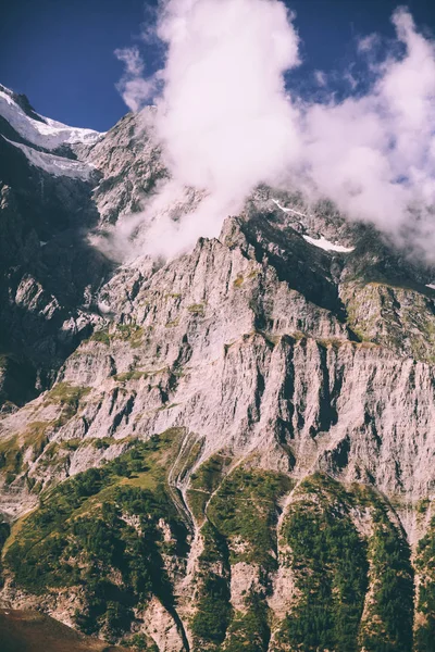 majestic landscape with rocky mountains and clouds in indian himalayas 