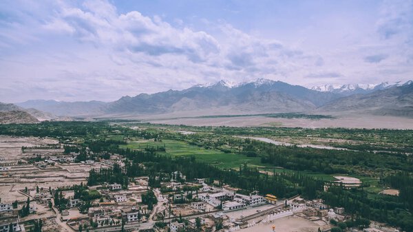 aerial view of Leh cityscape and beautiful mountains in Indian Himalayas