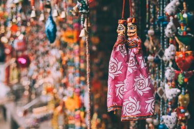 close-up view of colorful decorations hanging at Rajasthan, Pushkar clipart
