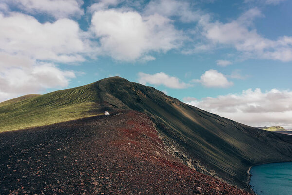 beautiful wedding couple standing together and amazing landscape in Iceland 